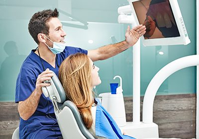 dentist-consulting-with-patient